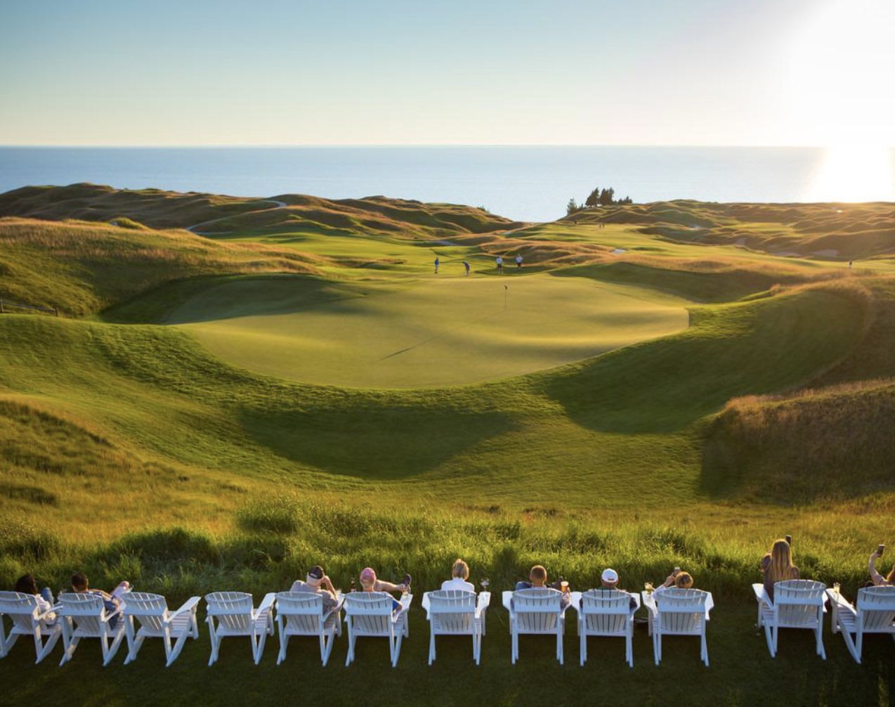 Relaxing above the course at sunset